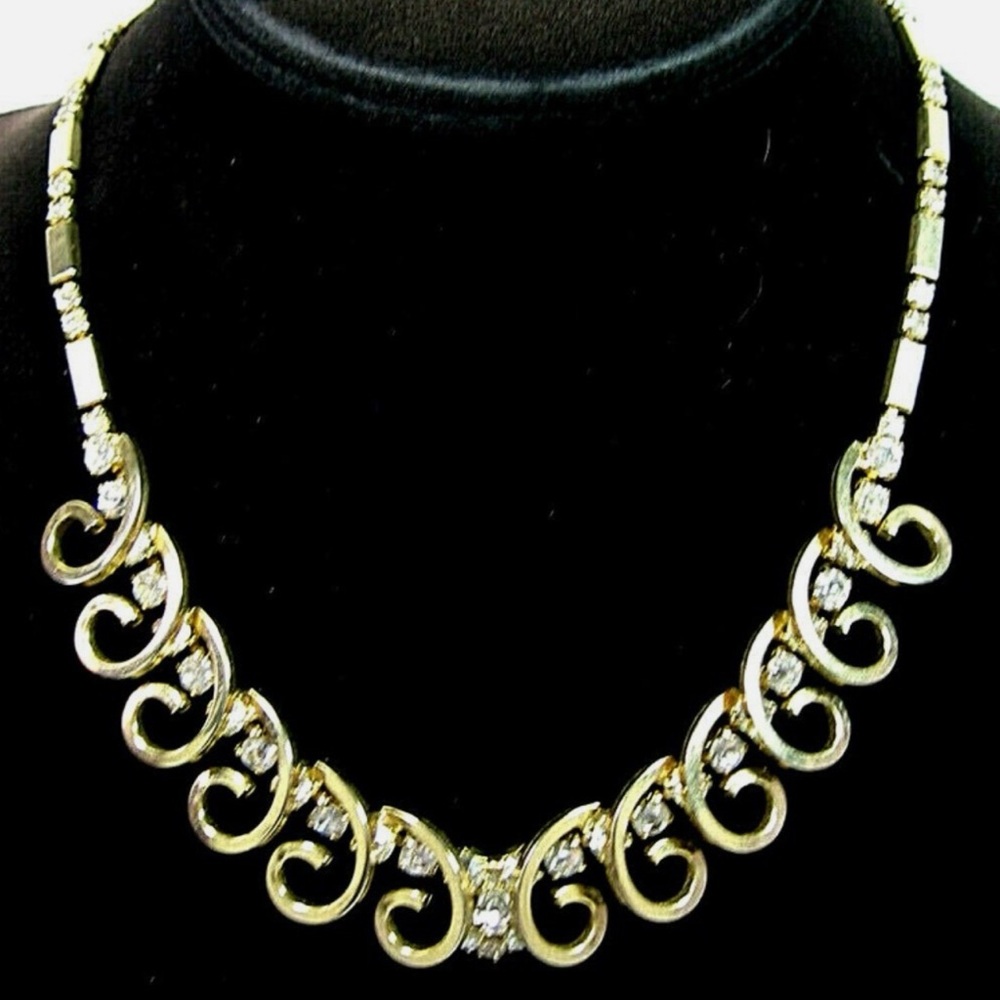 Elegant Gold and Silver Swirl Necklace